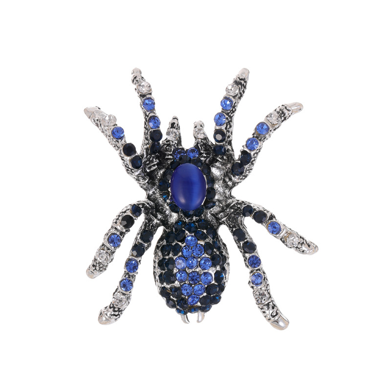 クリスタル品質の誇張されたスパイダーブローチ、大きなパールア - Al Ain Jewelry & Watches Exhibition 2025 のレビューと価格